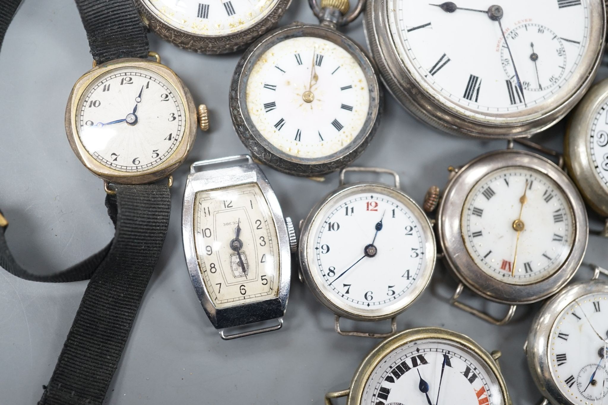 A George V silver open faced pocket watch, two silver or white metal fob watches and nine assorted mainly early 20th century wrist watches including silver.